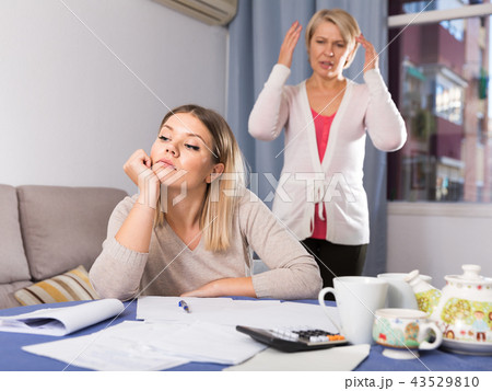 Mother scolds her adult daughter Mother scolds her adult daughter 43529810