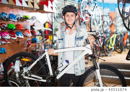 Young teenage boy looking for new sport bike 43531074