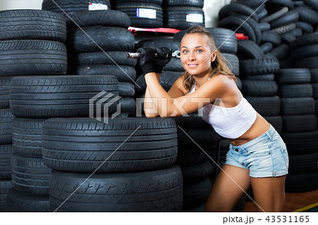 Girl working as auto mechanic 43531165