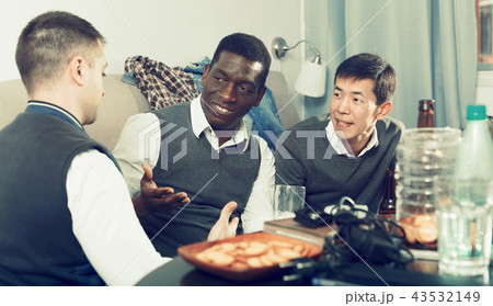 Males friendly meeting over beer Males friendly meeting over beer 43532149