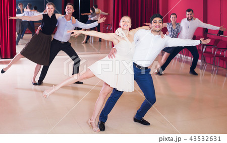 Glad people practicing passionate samba 43532631