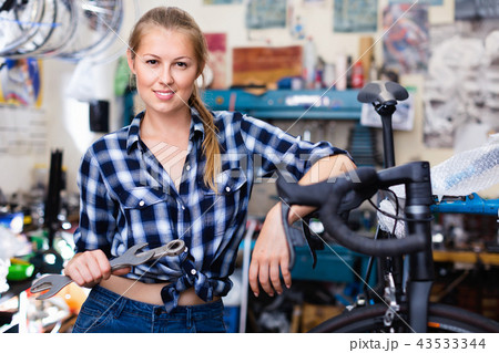 Portrait of girl who is working with instruments in workshop for 43533344