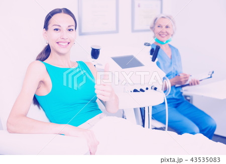 Satisfied female patient in esthetic clinic Satisfied female patient in esthetic clinic 43535083