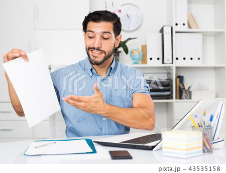 Smiling man is talking about contract 43535158