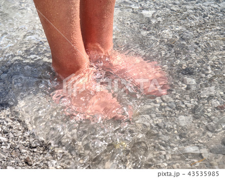 Hairy legs  cold water of mountain lake 43535985