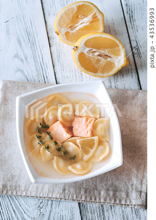 Portion of seafood ravioli soup Portion of seafood ravioli soup 43536993