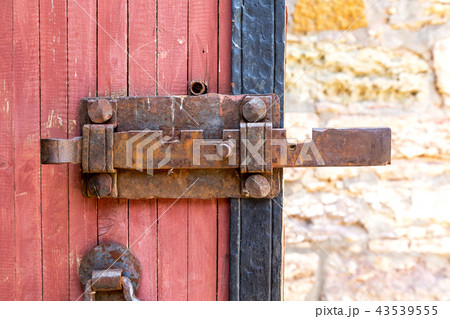 Antique rusty forged massive metal door lock 43539555
