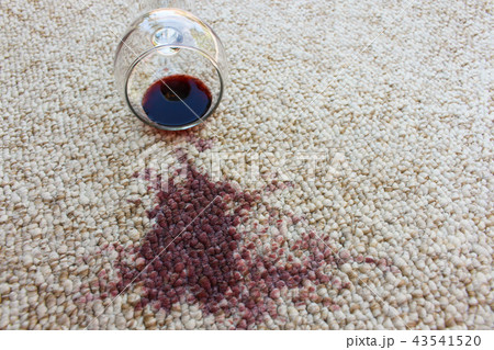 glass of red wine fell on carpet, wine spilled  43541520