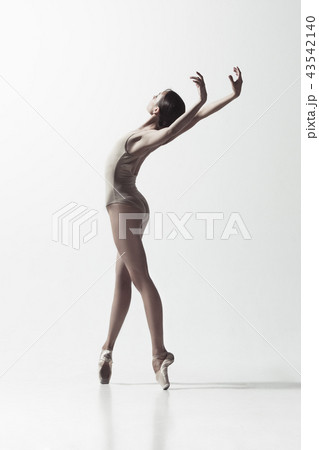Ballerina. Young graceful female ballet dancer dancing isolated on white. Beauty of classic ballet. Ballerina. Young graceful female ballet dancer dancing isolated on white. Beauty of classic ballet. 43542140