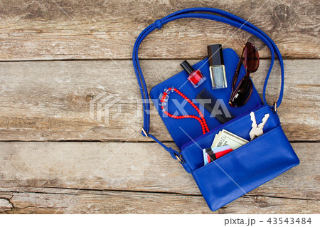 Things from open lady purse. Cosmetics  43543484