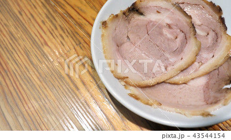 Chashu pork 3 pieces slice on dish 43544154