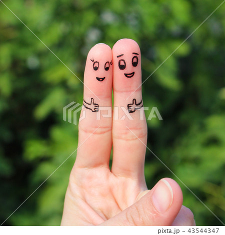 Finger art of Happy couple showing thumbs up Finger art of Happy couple showing thumbs up 43544347