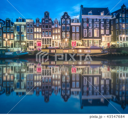 River, traditional old houses and boats, Amsterdam 43547684