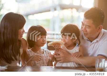 Asian family at cafe Asian family at cafe 43554919