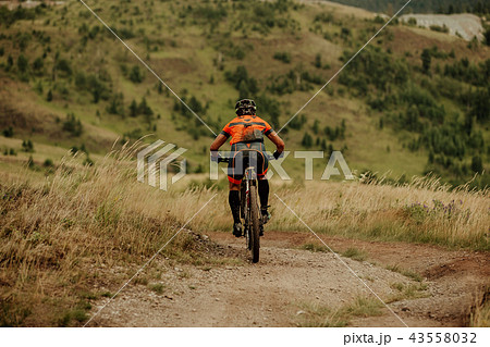 back muddy man mountainbiker back muddy man mountainbiker 43558032