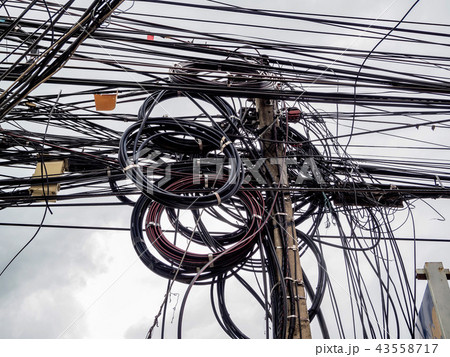 Chaotic line on electric pole on walking street. Chaotic line on electric pole on walking street. 43558717