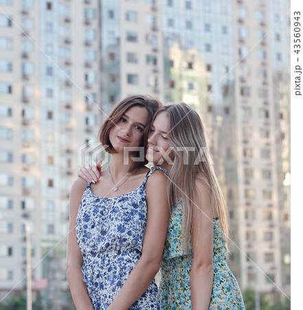 a pair of beautiful girls a pair of beautiful girls 43560943