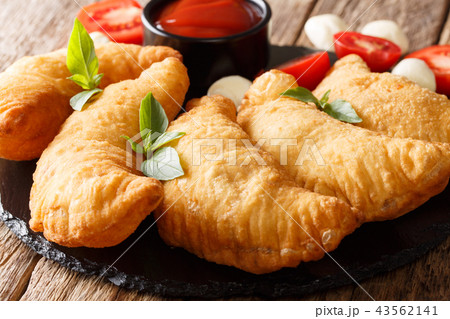 Italian fried donuts panzerotti close-up 43562141