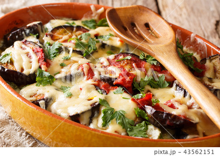 Spicy hot eggplant casserole with tomatoes Spicy hot eggplant casserole with tomatoes 43562151