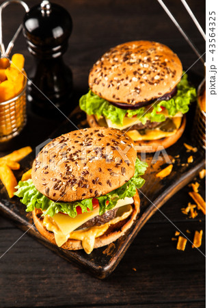 Delicious grilled burgers 43564325