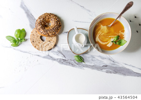 Pumpkin or carrot soup 43564504