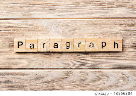 paragraph word written on wood block. 43566384