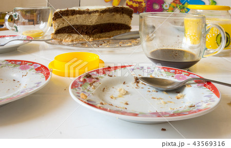 Dirty dishes on the table after home tea 43569316