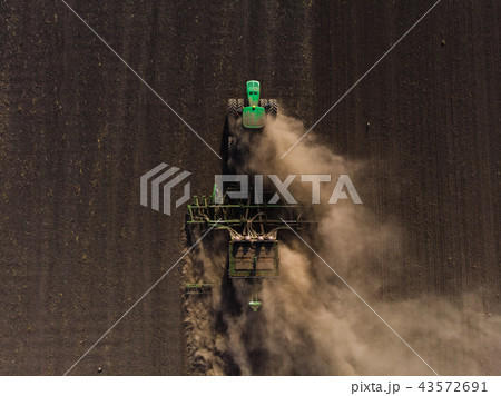 Sowing of winter wheat tractor from the air 43572691