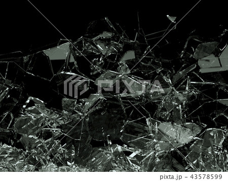 Pieces of glass broken or cracked on black 43578599