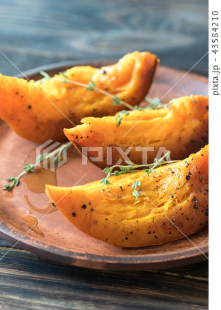 Baked pumpkin on the plate 43584210