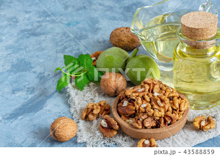 Cold pressed walnut oil and walnut kernel. Cold pressed walnut oil and walnut kernel. 43588859