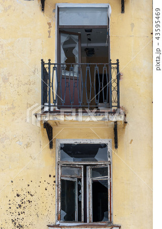 Broken window. Abandoned dwelling house in Russia Broken window. Abandoned dwelling house in Russia 43595469