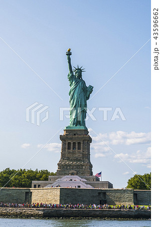 The statue of Liberty with blue sky background. The statue of Liberty with blue sky background. 43596662