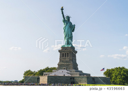 The statue of Liberty  with blue sky background. 43596663
