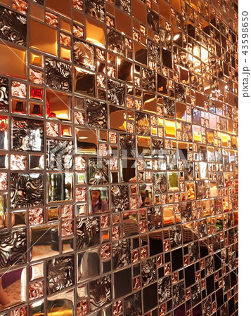 Small brown reflective sheet tiles. 43598650