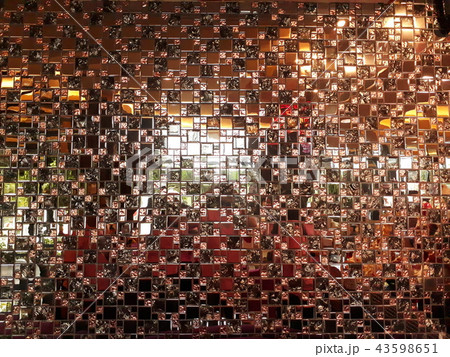 Small brown reflective sheet tiles. 43598651