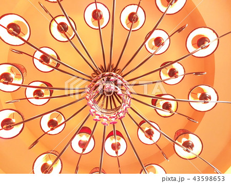 Many lamps hang the ceiling. 43598653