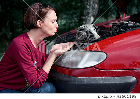 young girl with red car young girl with red car 43601198