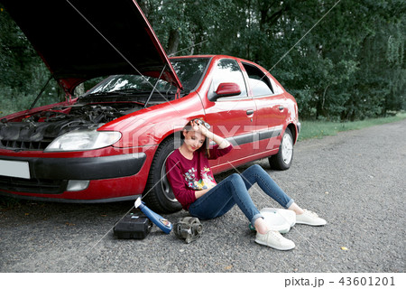 young girl with red car young girl with red car 43601201