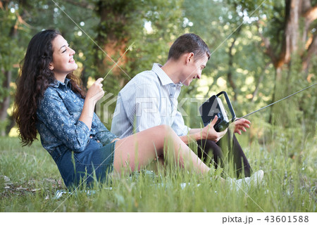 young couple walking in forest, romantic feelings 43601588