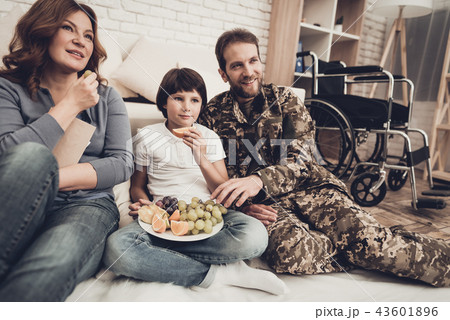 Paralyzed Veteran Is Watching TV With Family. Paralyzed Veteran Is Watching TV With Family. 43601896