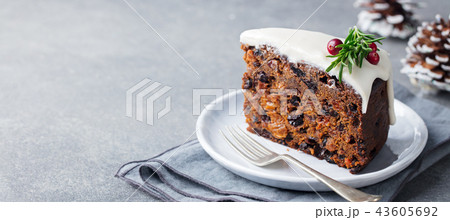 Christmas fruit cake, pudding on white plate. Copy space. 43605692