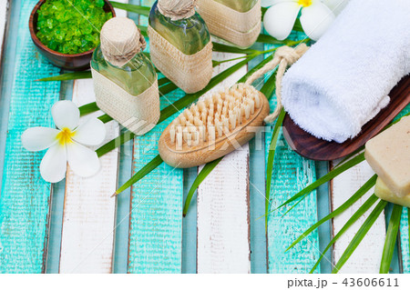 Spa and wellness massage setting. Still life with flower. Copy space. Top view. 43606611