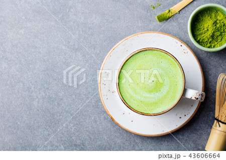 Matcha green tea latte in a cup. Top view. Copy space. 43606664