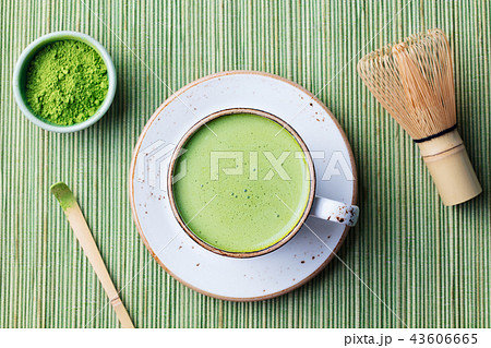 Matcha green tea latte in a cup. Top view. Organic product. Copy space. 43606665
