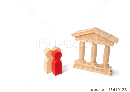 Red man in the head of the group stand near a bank Red man in the head of the group stand near a bank 43610128