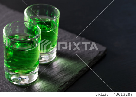 Two glasses of strong absinthe 43613285