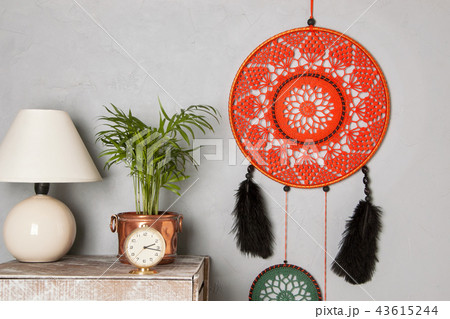 Dream catcher on gray background. Dream catcher on gray background. 43615244