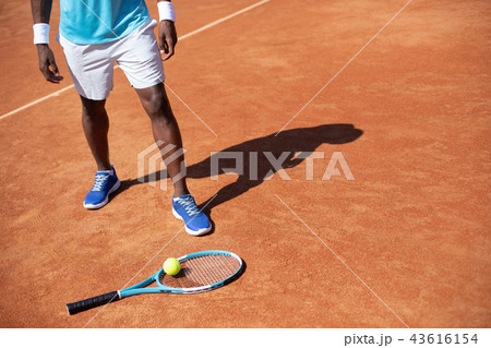 Man is resting after tennis game outdoor 43616154