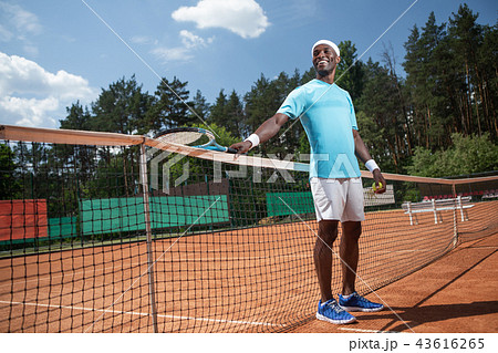 Happy man is having fun on court Happy man is having fun on court 43616265